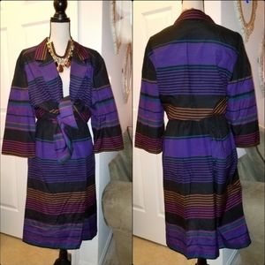 Skirt and unlined blazer suit.